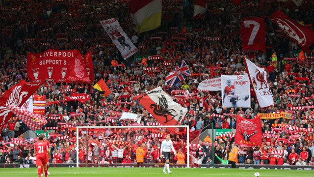 0-The-Kop-supports-their-team-Liverpool-with-flags.jpg